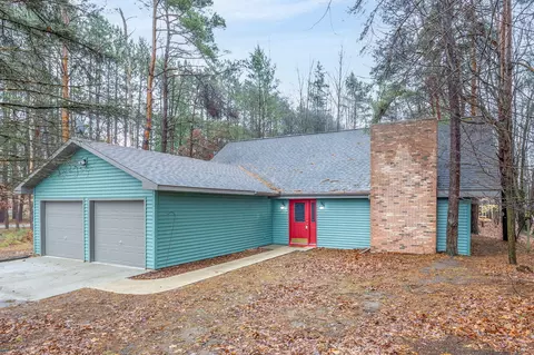 7701 River Ridge Rd, Canadian Lakes, MI 49346