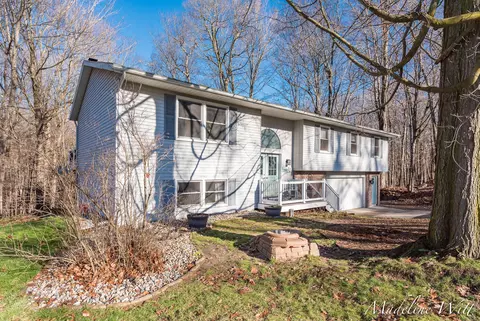 7791 Creekwood Dr SE, Alto, MI 49302
