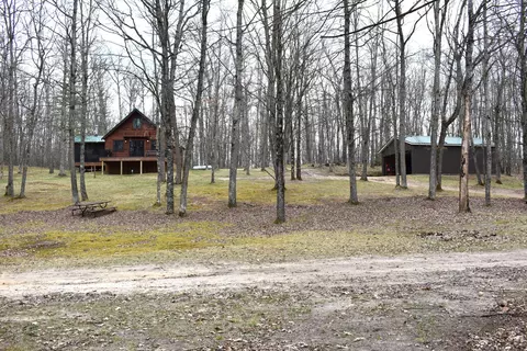 Exterior - 6590 Deer Path Dr, Chase, MI 49623 photo 4 of 14