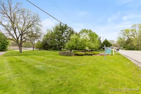 1041 Thornapple River Dr SE, Ada, MI 49301