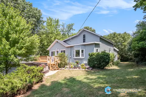12938 Pine Island Dr, Sparta, MI 49345