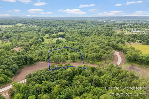 6230 Wilden Ridge Dr NE, Ada, MI 49301