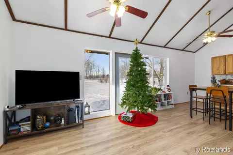 Living - 1067 Somers Rd, Lyons, MI 48851 photo 1 of 2