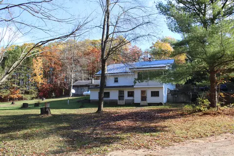 Exterior - 401 S Bass Lake Ave # A, Harrison, MI 48625 photo 10 of 26