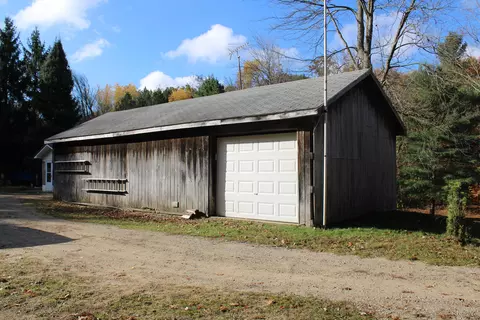 Exterior - 401 S Bass Lake Ave # A, Harrison, MI 48625 photo 15 of 26