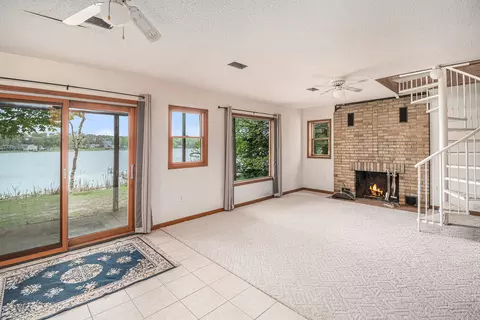 Living - 13085 Englewright Dr, Sand Lake, MI 49343 photo 4 of 5
