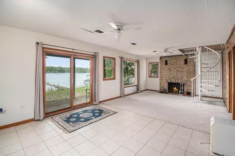 Living - 13085 Englewright Dr, Sand Lake, MI 49343 photo 3 of 5