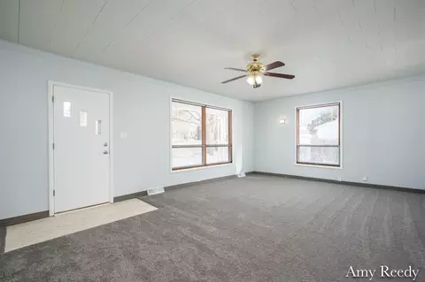 Living - 418 Elm St SE, Lowell, MI 49331 photo 1 of 4