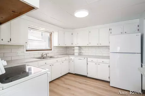 Kitchen - 418 Elm St SE, Lowell, MI 49331 photo 3 of 4