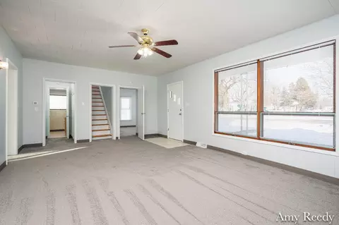 Living - 418 Elm St SE, Lowell, MI 49331 photo 3 of 4