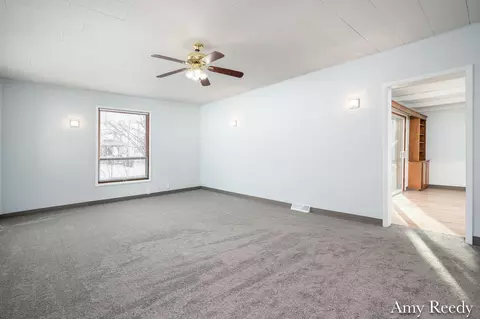 Living - 418 Elm St SE, Lowell, MI 49331 photo 2 of 4
