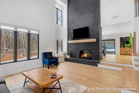 Living - 400 Greentree Ln NE, Ada, MI 49301 photo 2 of 3