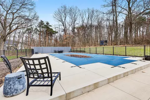 Exterior - 400 Greentree Ln NE, Ada, MI 49301 photo 11 of 14