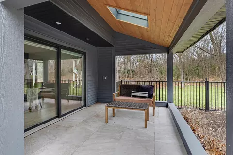 Exterior - 400 Greentree Ln NE, Ada, MI 49301 photo 6 of 14