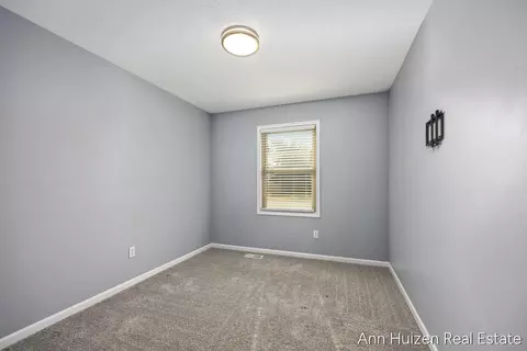 Bedroom - 1829 Sunset Dr, Dorr, MI 49323 photo 2 of 3