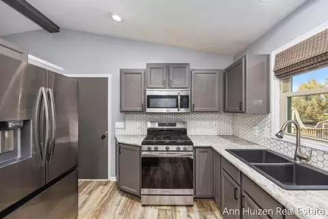 Kitchen - 1829 Sunset Dr, Dorr, MI 49323 photo 2 of 3