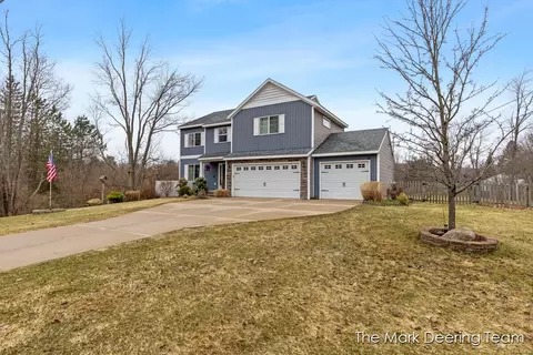 Exterior - 8471 45th St SE, Ada, MI 49301 photo 3 of 22