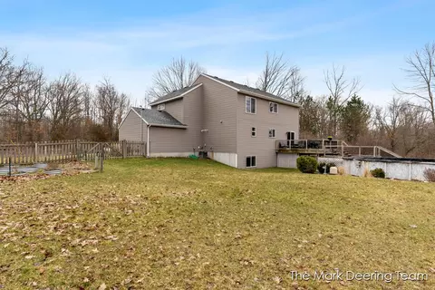 Exterior - 8471 45th St SE, Ada, MI 49301 photo 5 of 22