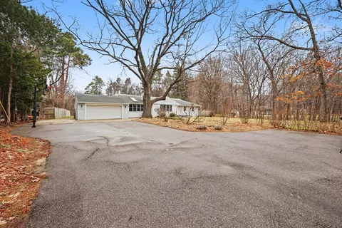 Exterior - 5505 Fulton St NE, Ada, MI 49301 photo 2 of 11