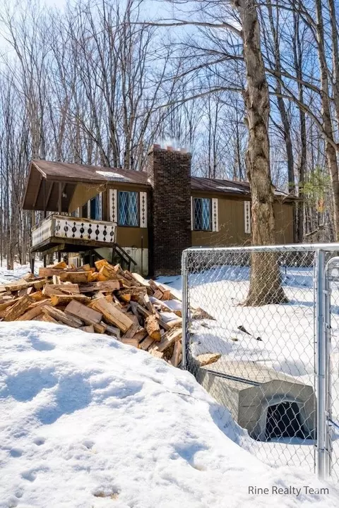7542 Wyndamar Dr, Mancelona, MI 49659