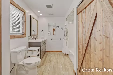 Bath - 6384 N Mac Rd, Irons, MI 49644 photo 1 of 5