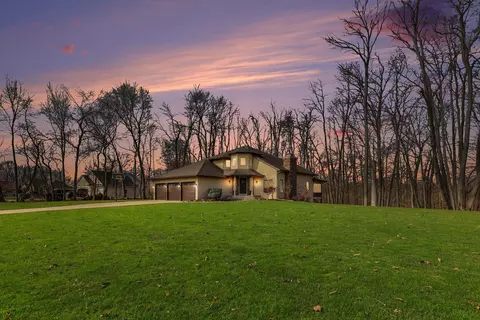 Exterior - 2011 Knollpoint Dr NE, Ada, MI 49301 photo 2 of 8