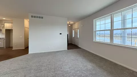 Living - 1246 Plum Grove Dr, Monroe, MI 48161 photo 3 of 3