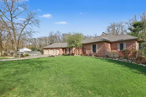 2864 Riverwoods Dr NE, Rockford, MI 49341