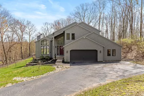 7721 Sun Quest Ridge Dr NE, Ada, MI 49301