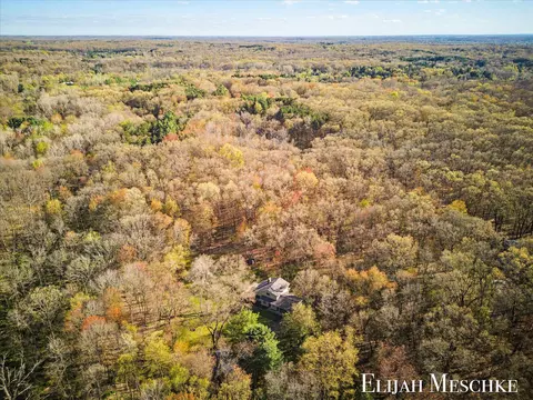 9000 Crooked Crow Rd NE, Ada, MI 49301