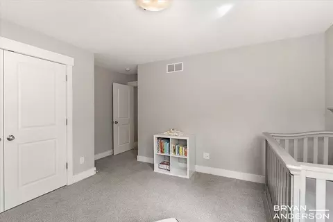 Bedroom - 6380 5 Mile Rd NE, Ada, MI 49301 photo 4 of 9