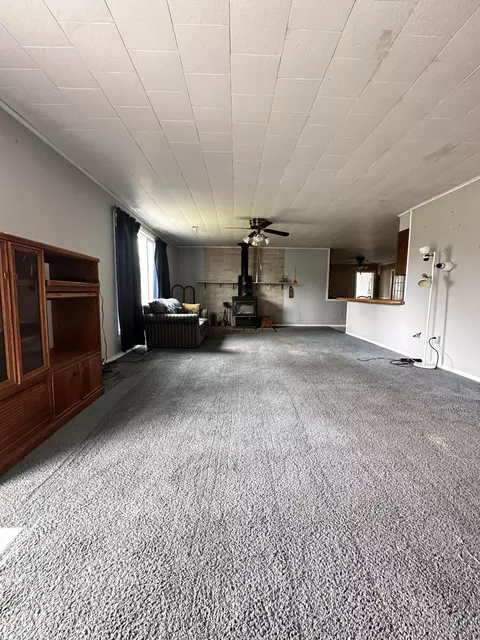 Living - 955 E 11 Mile Rd, Irons, MI 49644 photo 2 of 2