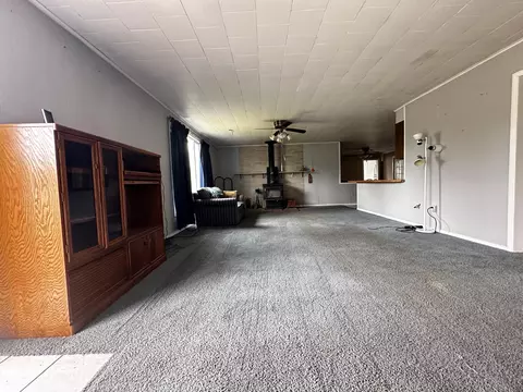 Living - 955 E 11 Mile Rd, Irons, MI 49644 photo 1 of 2