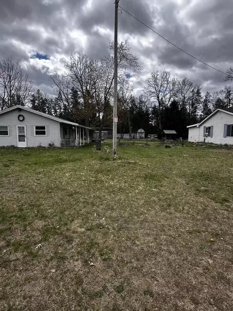 Exterior - 955 E 11 Mile Rd, Irons, MI 49644 photo 4 of 21