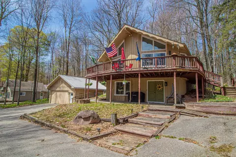 9530 Golf Port Dr, Canadian Lakes, MI 49346