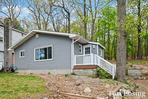 16950 Shawano Dr NE, Sand Lake, MI 49343