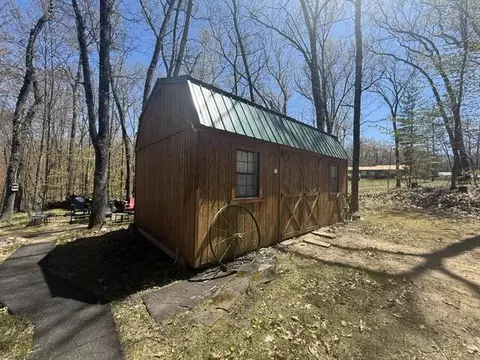 Exterior - 9826 S Orchid Ave, Baldwin, MI 49304 photo 4 of 31