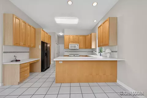 Kitchen - 57 Rollingbrook Dr NE, Ada, MI 49301 photo 3 of 4