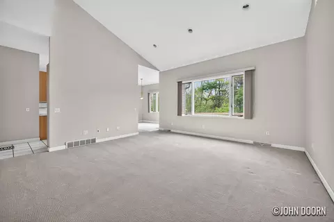 Living - 57 Rollingbrook Dr NE, Ada, MI 49301 photo 2 of 3