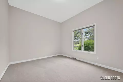 Bedroom - 57 Rollingbrook Dr NE, Ada, MI 49301 photo 7 of 7