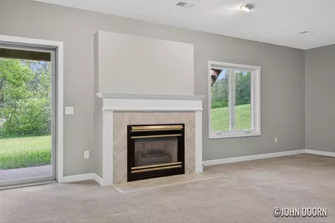 Living - 57 Rollingbrook Dr NE, Ada, MI 49301 photo 3 of 3