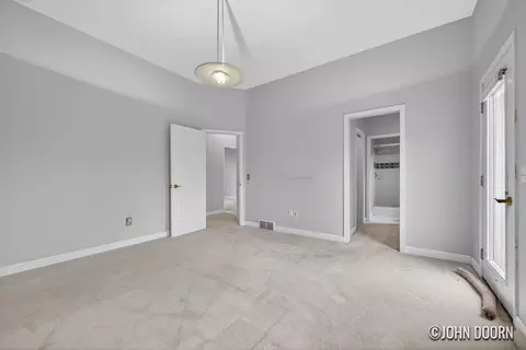 Bedroom - 57 Rollingbrook Dr NE, Ada, MI 49301 photo 5 of 7