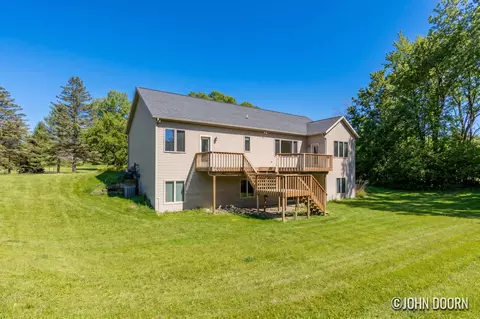 Exterior - 57 Rollingbrook Dr NE, Ada, MI 49301 photo 3 of 3