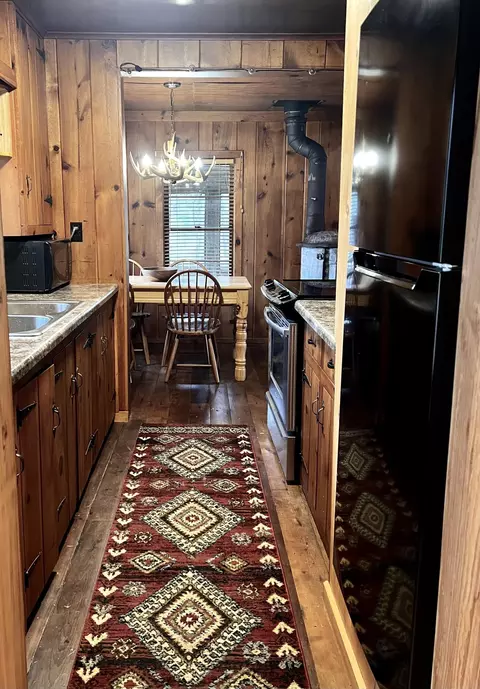 Kitchen - 3490 W Stuck Rd, Irons, MI 49644 photo 3 of 3