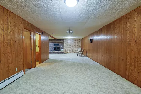 Living - 7480 E 5 Mile Rd, White Cloud, MI 49349 photo 7 of 8