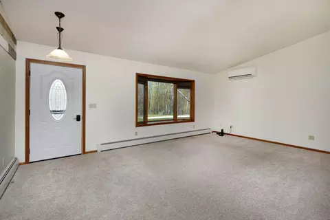 Living - 7480 E 5 Mile Rd, White Cloud, MI 49349 photo 1 of 8