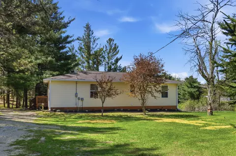 Exterior - 7492 E Townline Lake Rd, Harrison, MI 48625 photo 3 of 9