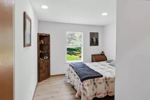 Bedroom - 7492 E Townline Lake Rd, Harrison, MI 48625 photo 3 of 4