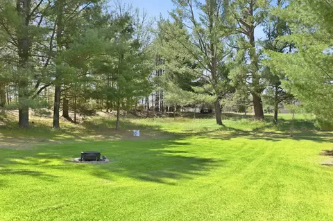Exterior - 7492 E Townline Lake Rd, Harrison, MI 48625 photo 7 of 9