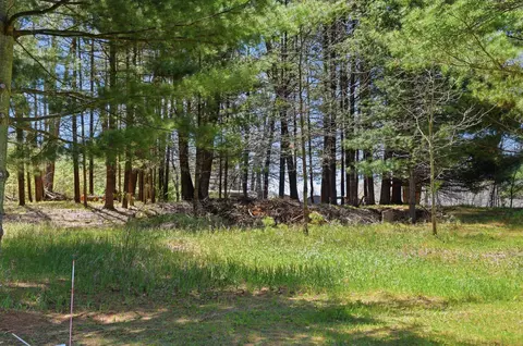 Exterior - 7492 E Townline Lake Rd, Harrison, MI 48625 photo 8 of 9